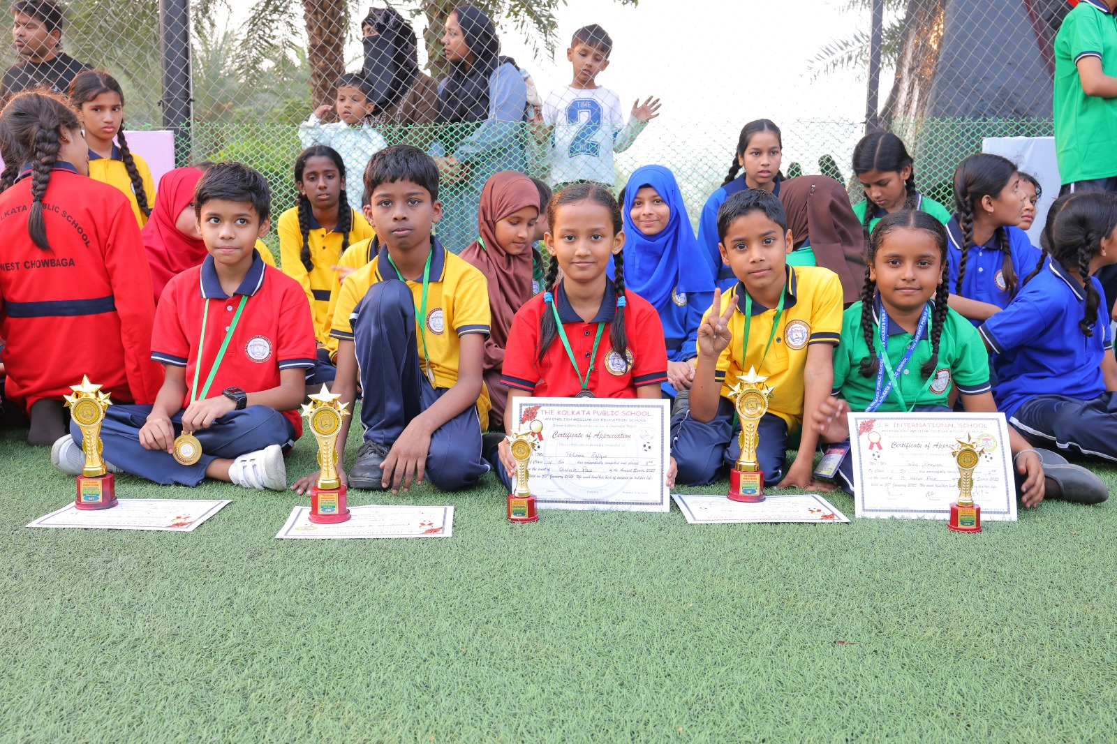 School students celebrating their sporting achievements